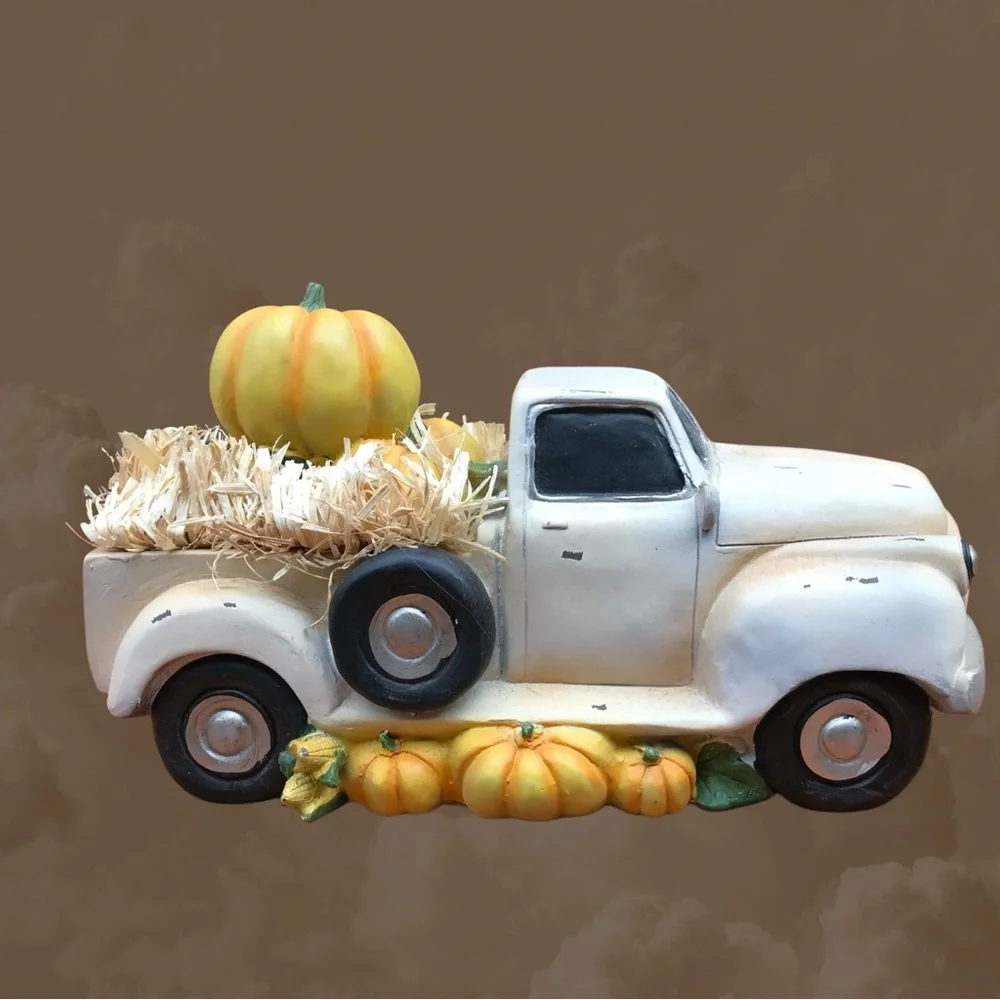 Plow & Hearth in orig.box vintage truck full of pumpkins. Great fall display.
